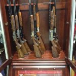 sstaggered long gun cabinets display